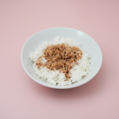 Bowl of white rice with sauce