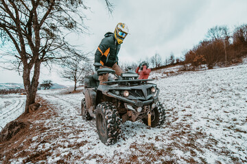  An adventurous couple prepares for an exhilarating quad ride through the forest, embodying...