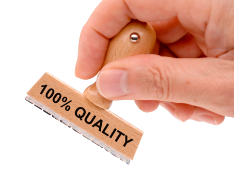 Rubber stamp in hand with the inscription 100 % quality