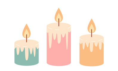 set of wax candles for home interior. pink, yellow and turquoise candle