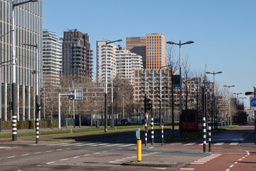 Fototapeta na wymiar Zuidas, the business, legal and financial district of Amsterdam with many high-rise apartments and office buildings.