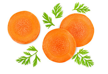 chopped carrot slices with leaves on a white isolated background, top view - obrazy, fototapety, plakaty