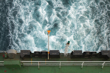 View of the propeller wash seen from the aft deck of a ship