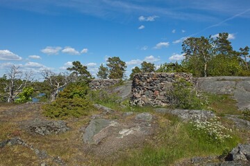 Fototapeta na wymiar Remains of WW2 coastal battery positions in summer, Hanko, Finland.