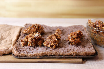 A sweet filling of peanuts, cinnamon and chocolate is added to the pastry. Making cakes