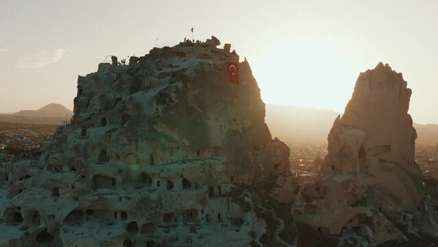 The Famous Uchhisar Cave Castle In Cappadocia, At Sunset, Turkey, Aerial View