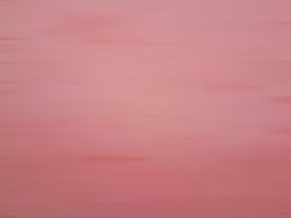 Red-pink blurred background, abstract pattern used for texture.
