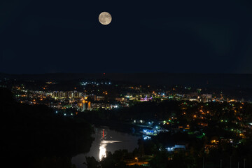 Composite photos of moon over morgantown