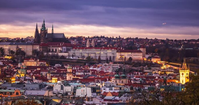 Illuminated Prague Castle at night time lapse