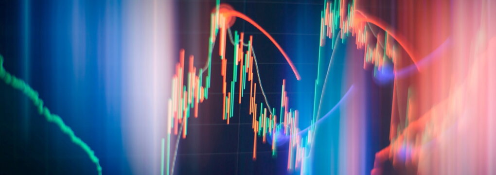 Financial trading graphs on monitor. analysis on the monitor of a computer. Fundamental and technical analysis concept.