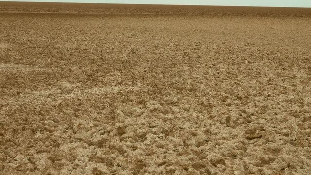 Soil science. An ephemeral lake in the desert that does not periodically fill with water. Puffed solonchak at this time. Iranian deserts