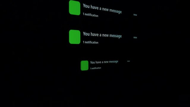 Notification Green Icon of Text Messaging, Online Messaging or E-Mail on Black Device Screen Smart Phone show notifies that there is a new text message. 5G or Wireless technology.