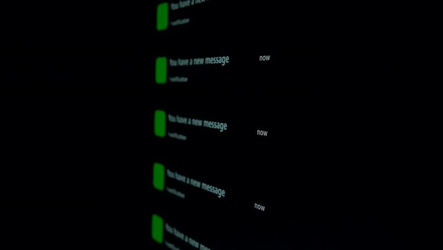 Notification Green Icon of Text Messaging, Online Messaging or E-Mail on Black Device Screen Smart Phone show notifies that there is a new text message. 5G or Wireless technology.