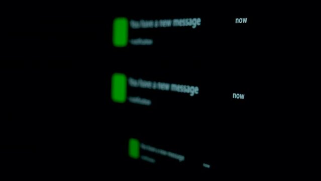 Notification Green Icon of Text Messaging, Online Messaging or E-Mail on Black Device Screen Smart Phone show notifies that there is a new text message. 5G or Wireless technology.