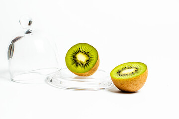 Ripe kiwi on a white background