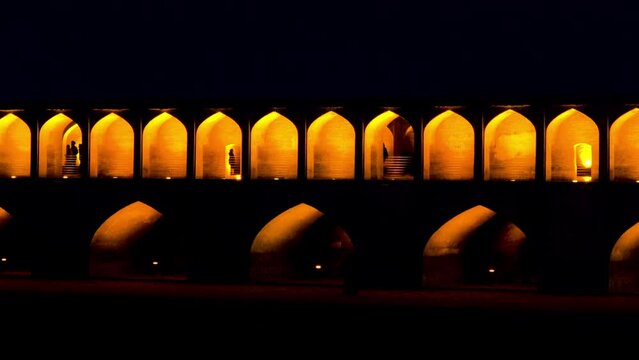 Old Khajoo bridge at night, across the Zayandeh River in Isfahan, Iran.