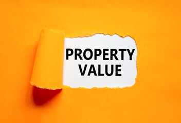 Property value symbol. Concept words Property value on beautiful white paper. Beautiful orange...