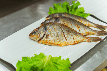 cooking fresh fish for the Kazakh holiday. sea fish for a healthy dinner.