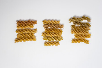 Raw pasta of different colors