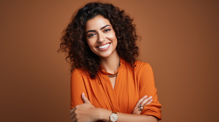 Studio portrait of a happy woman with curly hair
