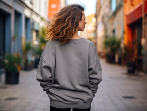 Walking Woman Back View Wearing Oversize Dark Grey Gildan