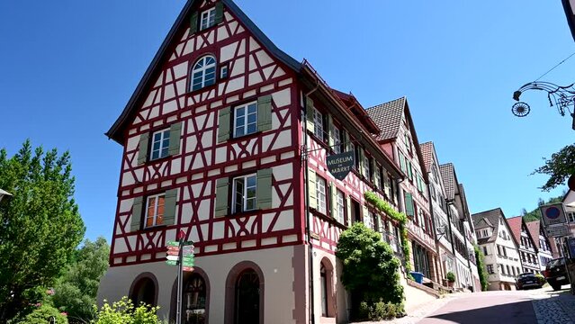 Schiltach, Germany - 07 02 2022: A beautiful red half-timbered house in the city of Schiltach in the Black Forest of Germany.
