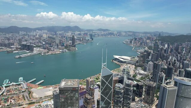 Hong Kong Wan Chai Central Admiralty Causeway Bay CBD facing Victoria Harbour Kowloon Tsim Sea Tsui ,4K drone shot of property commercial area