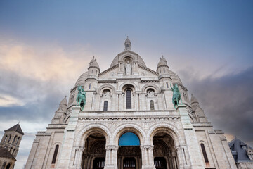 Basilica of Sacred Heart (Basilique du Sacre-Coeur) on Montmartre Hill, Paris, France. Beautiful...