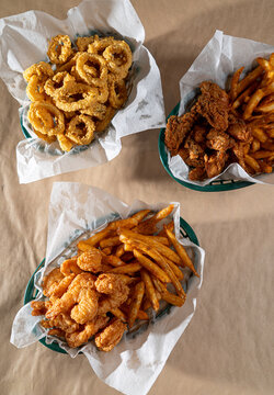 group of fried seafood baskets on table