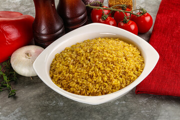 Dry wheat bulgur cereal heap