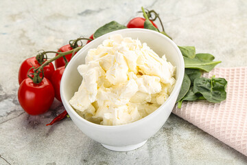 Soft cream cheese in the bowl