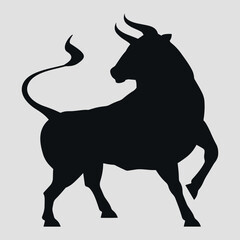 Black silhouette of a bull. Vector on a gray background