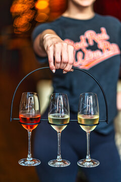 Wine flight served by waitress