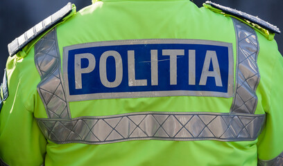 police sign on a jacket