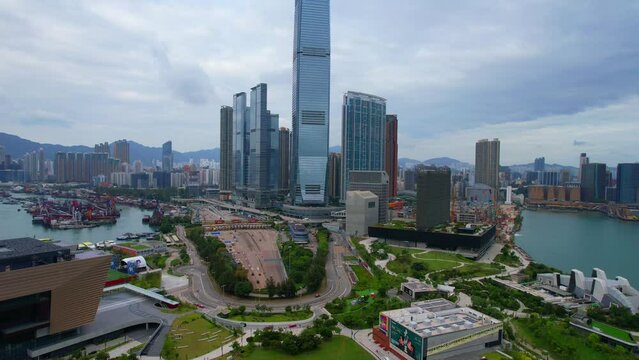 West Kowloon Cultural Area, A Waterfront Leisure Promenade Palace Museum Freespace near Tsim Sha Tsui, Central, Victoria Harbour, Hong Kong in the background, Aerial drone skyview