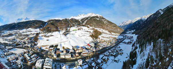 Aerial view of the Otztal Valley in Soelden Alpine resort with the ski lifts. Winter time.