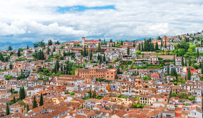 View of the Albaicin medieval district of Granada, medieval charm unfolds from above in this aerial view. Traditional houses and historic streets encapsulate the timeless allure of Andalusia.