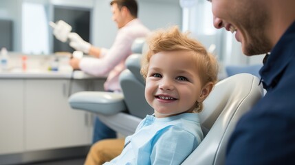 Portrait of young boy smilling sitting in dentist office chair