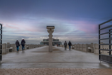 
the pier of the Belgian picket fence on the Belgian coast or the Flemish coast. Tourism Belgian coast with beautiful weather conditions. North Sea tourism