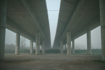Foggy morning under the bridge viaduct