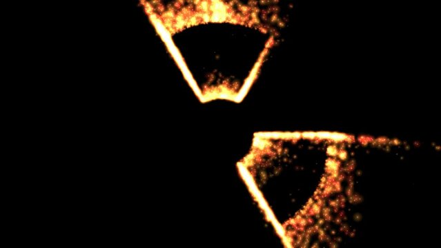 Radioactive sign made by burning flames on black background