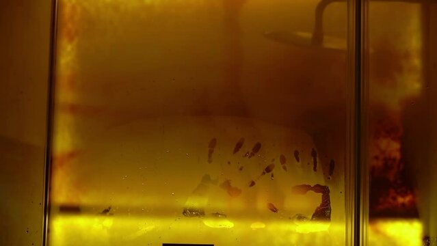 Silhouette of hands. Couple in backlight kissing in shower. Man and woman unrecognizable have sex.