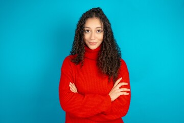 Serious pensive beautiful teen girl  feel like cool confident entrepreneur cross hands.