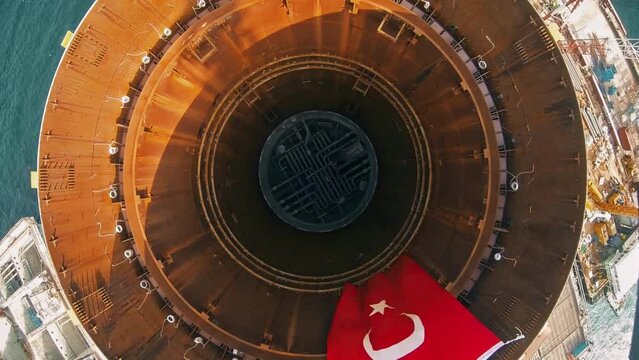 image of naval construction bridge pillars and Turkish flag