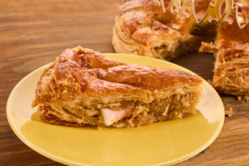 Galette des rois on wooden table.Traditional Epiphany cake in France