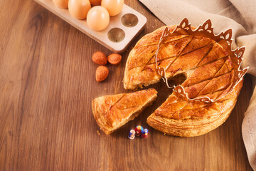 Galette des rois on wooden table.Traditional Epiphany cake in France