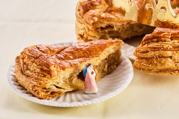Epiphany cake on wooden table. Galette des rois traditional Epiphany cake in France