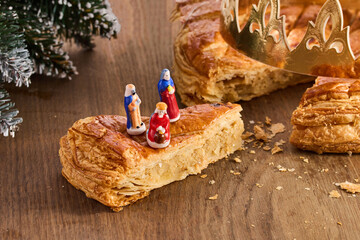 Galette des rois on wooden table.Traditional Epiphany cake in France