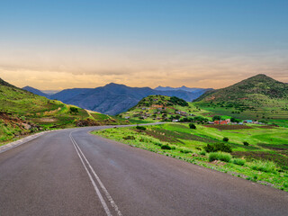 Winding road going through a lesotho village on the mountain, Mantsa, Kingdom of Lesotho