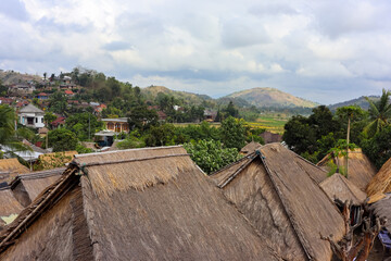 Fototapeta na wymiar Tatched roof of Sasak tribe traditional house in Sade village, Lombok island, Indonesia.